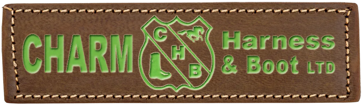 Brown leather label with green &ldquo;CHARM Harness & Boot Ltd&rdquo; logo and text.