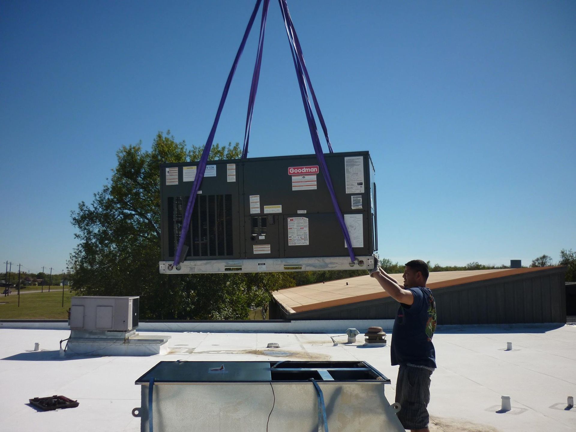 Lifting HVAC Unit - Freeport, TX - A1 Comfort Systems