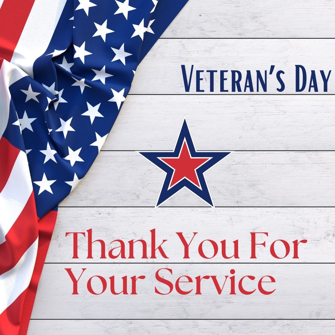 A sign that says veteran 's day thank you for your service