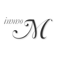 Un logo noir et blanc avec la lettre m sur fond blanc.