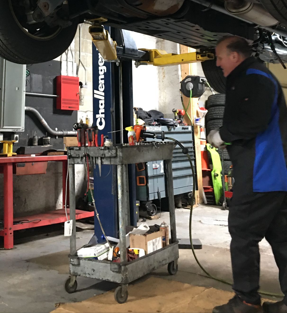 Expert technician in garage in Melrose, MA | Certified Automotive Solutions