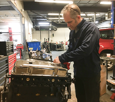 Expert technician working in our garage in Melrose, MA | Certified Automotive Solutions