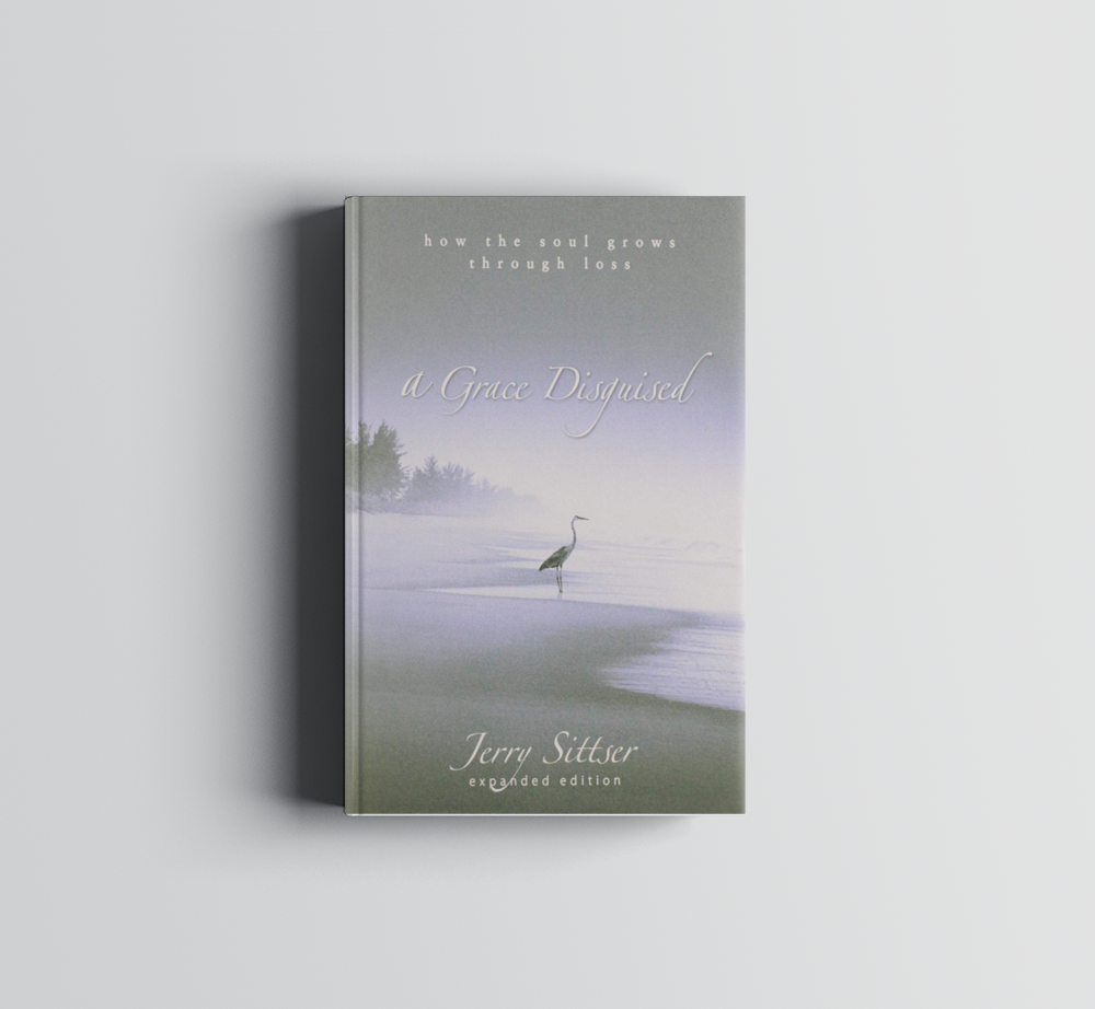 A book with a bird on the cover titled a Close Distance, by Jerry Sittser
