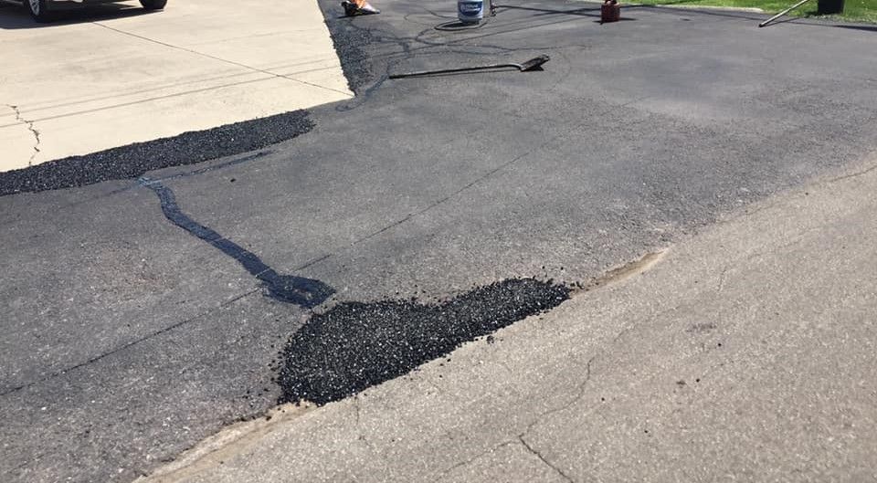 Image of a section of road that was patched by Midwest Seal Team.