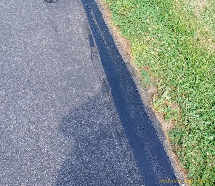 Image of a side of a road that has been repaired in Kendallville Indiana. 
