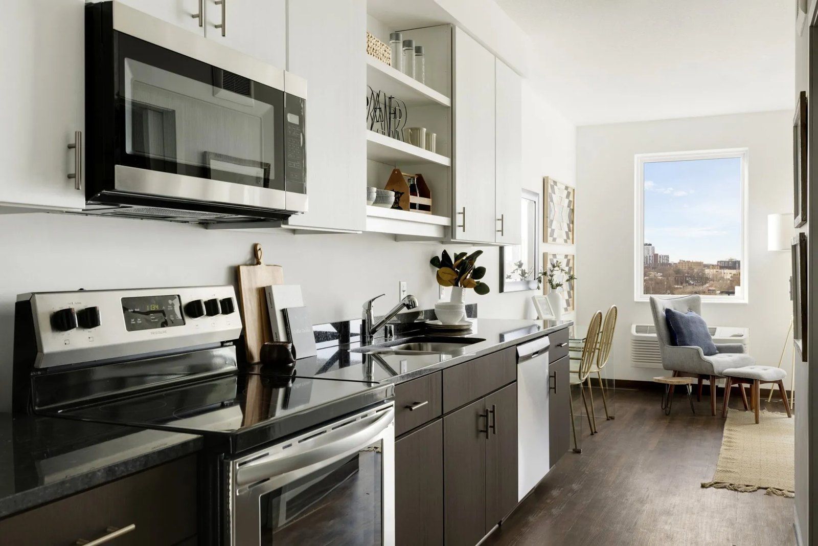 Full kitchen with stainless steel appliances in a Rym apartment in Minneapolis