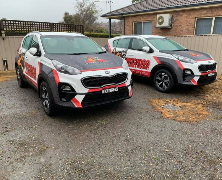 Two Cars Are Parked Next To Each Other — Goulburn Automotive Centre In Goulburn, NSW