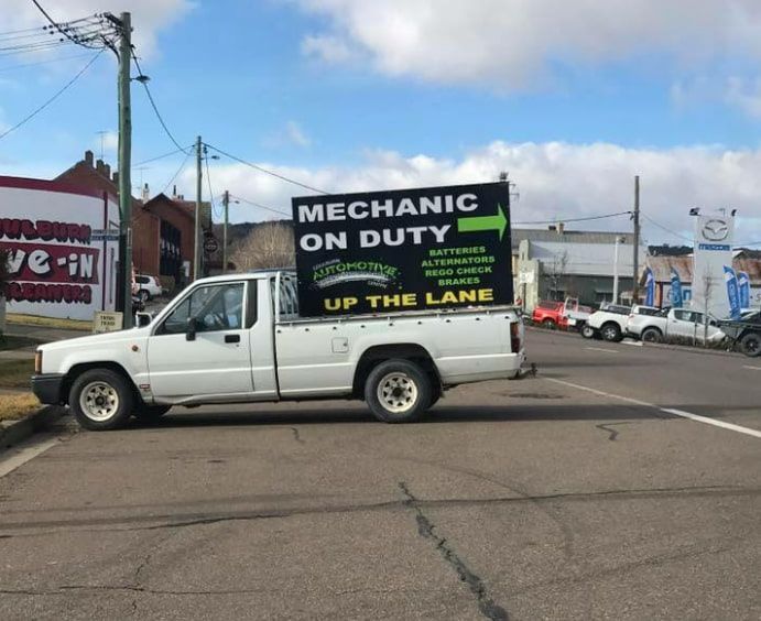 A Mechanic On Duty Truck Is Parked On The Side Of The Road — Goulburn Automotive Centre In Goulburn, NSW