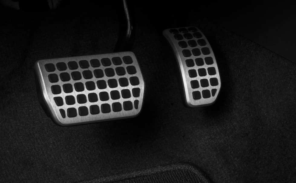 A Black And White Photo Of A Car 's Brake Pedals — Goulburn Automotive Centre In Goulburn, NSW