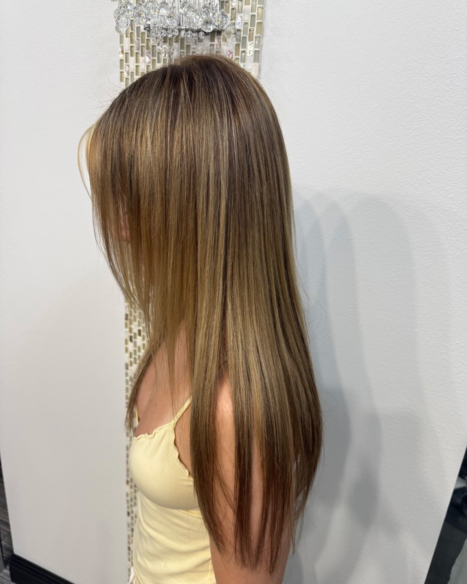 long dimensional blonde, side view