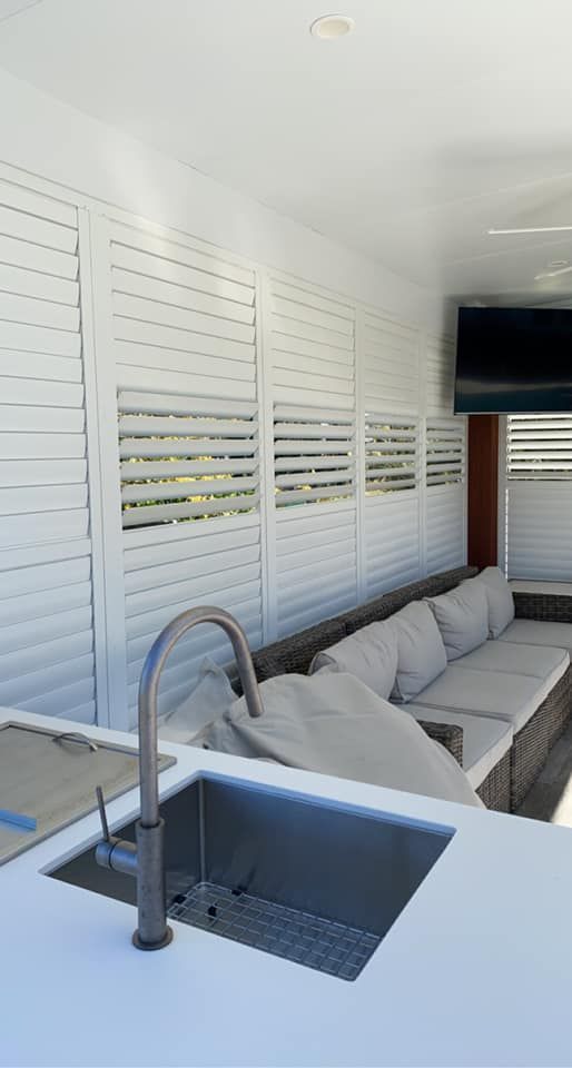 Bright White Patio with Outdoor Sofa — Tamworth Blinds & Awnings in Tamworth, NSW