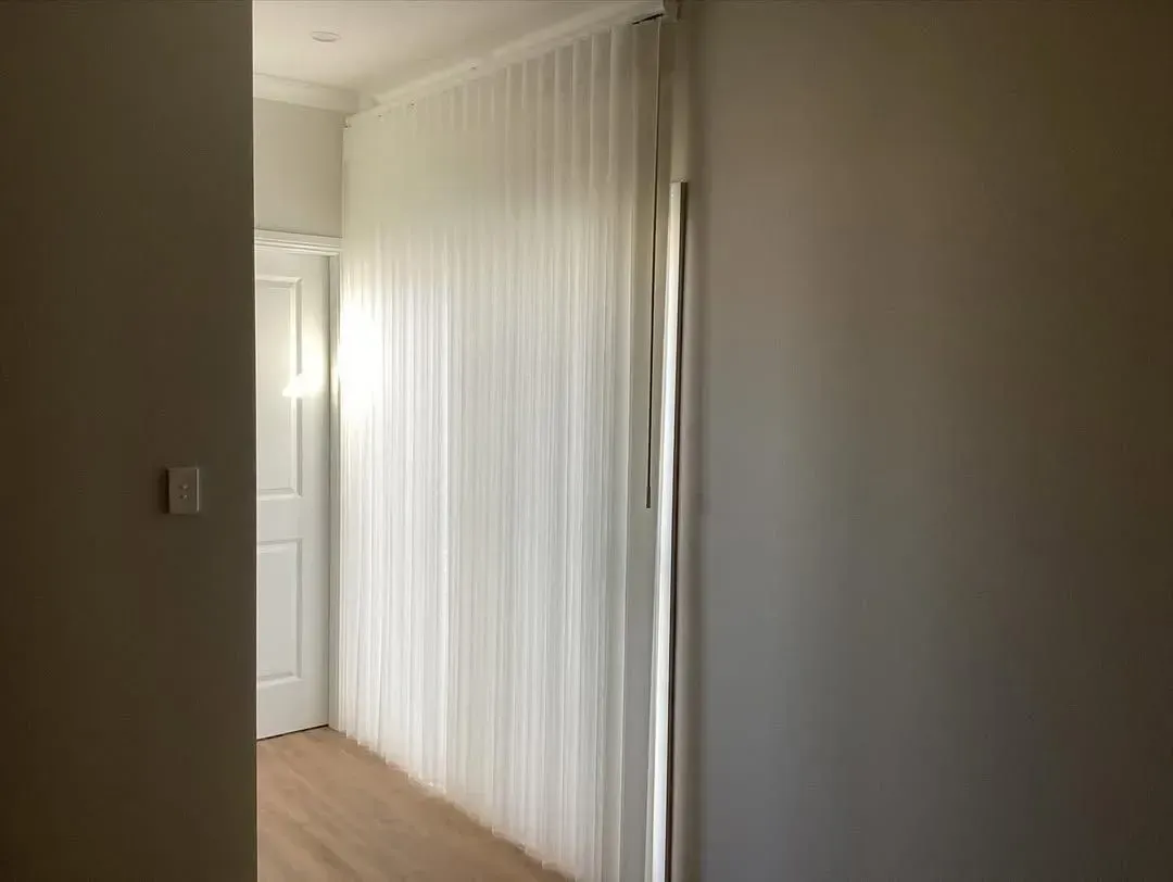 Small Beige Bedroom with A Window with Blinds — Tamworth Blinds & Awnings in Tamworth, NSW