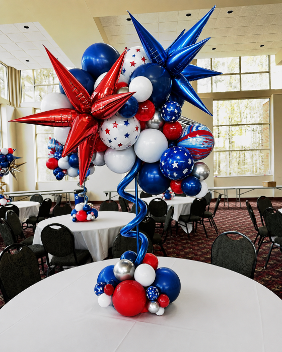 American flag themed organic balloon table centerpiece decor for 4th of July rooftop party at Los Angeles venue event