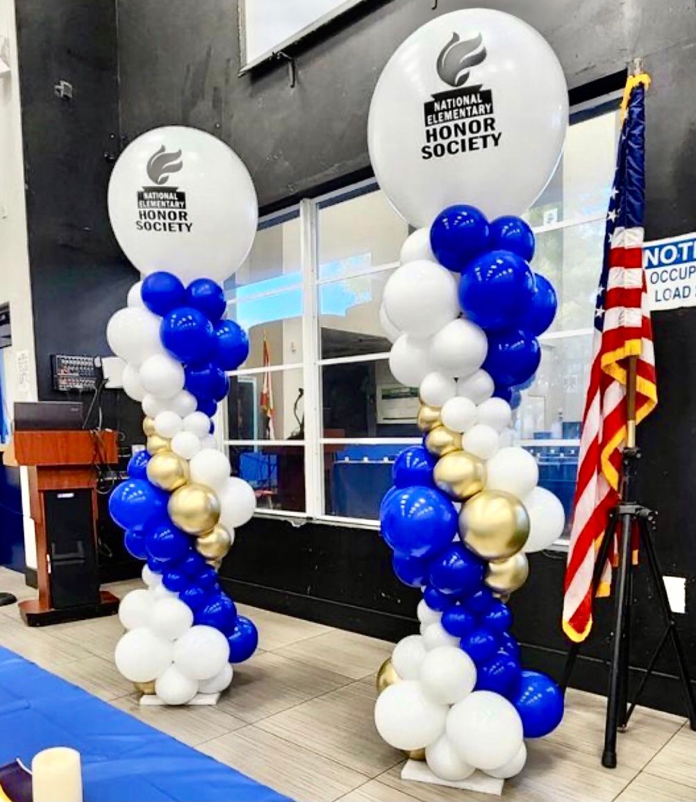 Elegant balloon stage décor for corporate presentation in Los Angeles
