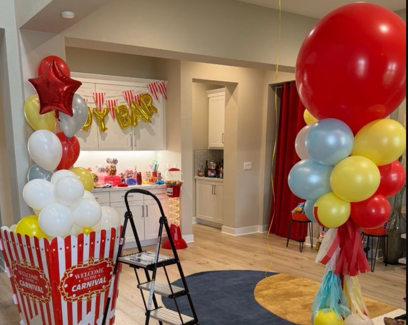 Carnival balloon birthday theme indoors