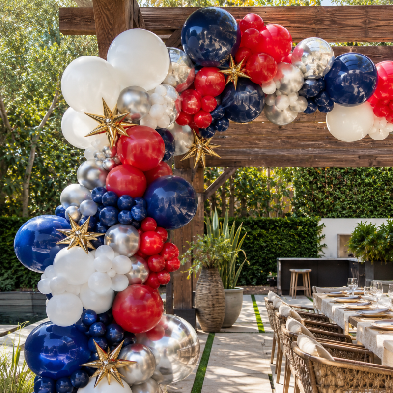 Red, white and blue organic balloon garland for 4th of July party in Los Angeles backyard