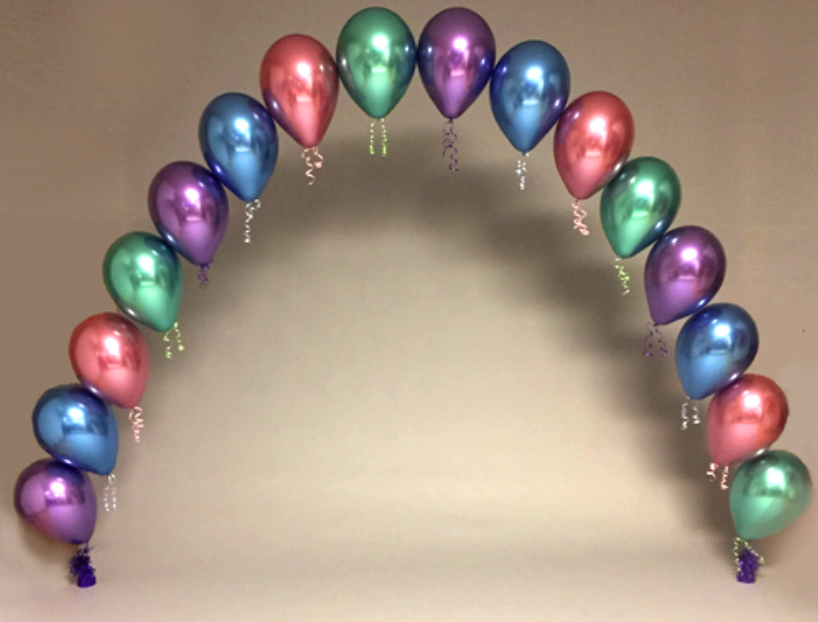 Balloon arch in shades of pink, blue, purple, and green. Balloons are metallic and arranged in an arch shape.