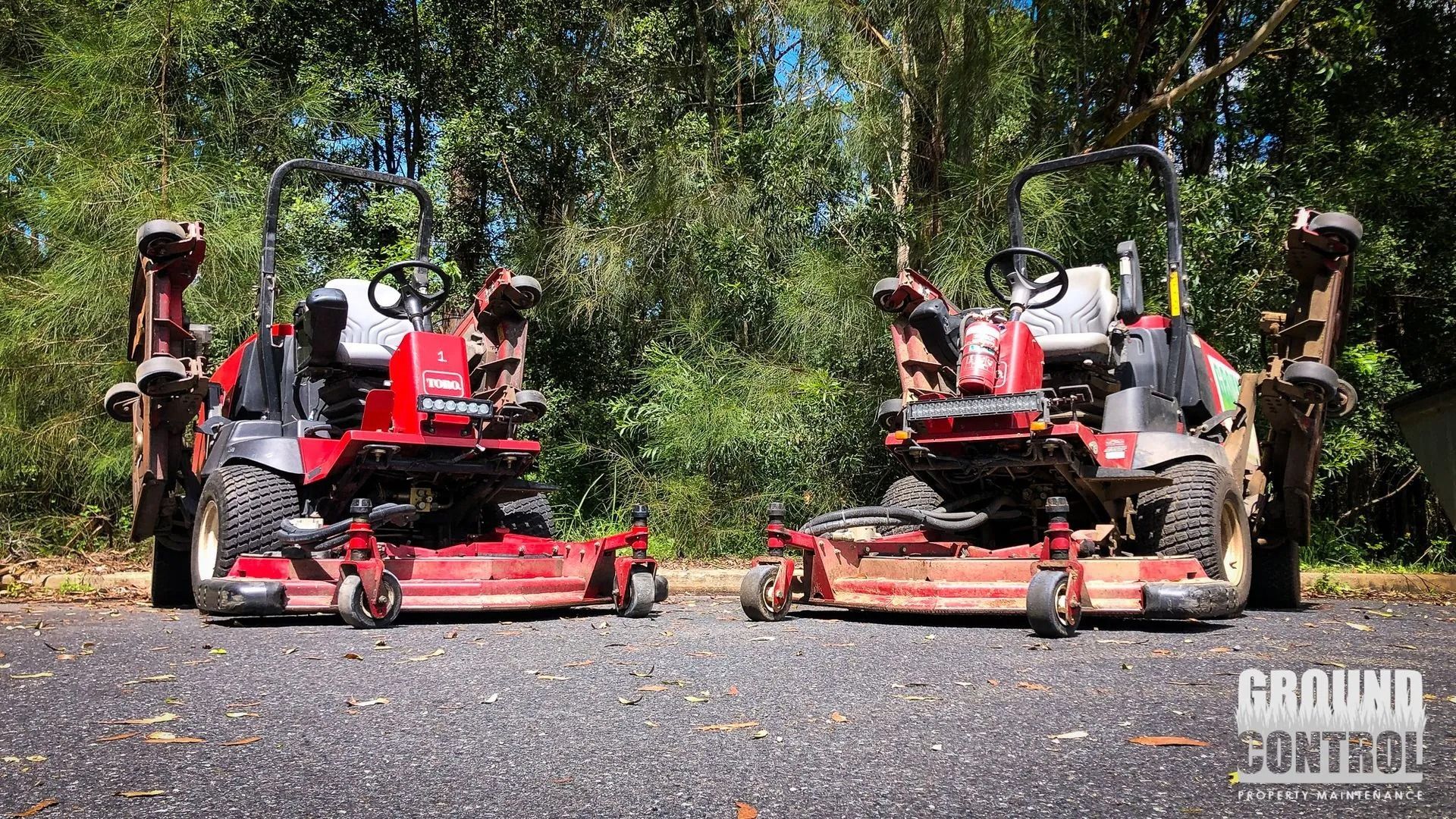 Man Using a Weed Whacker to Cut Tall Grass — Ground Control Property Maintenance In North Boambee Valley, NSW