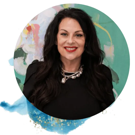 Woman with dark hair smiles, wearing a black top and pearl necklace, set against an abstract floral background.