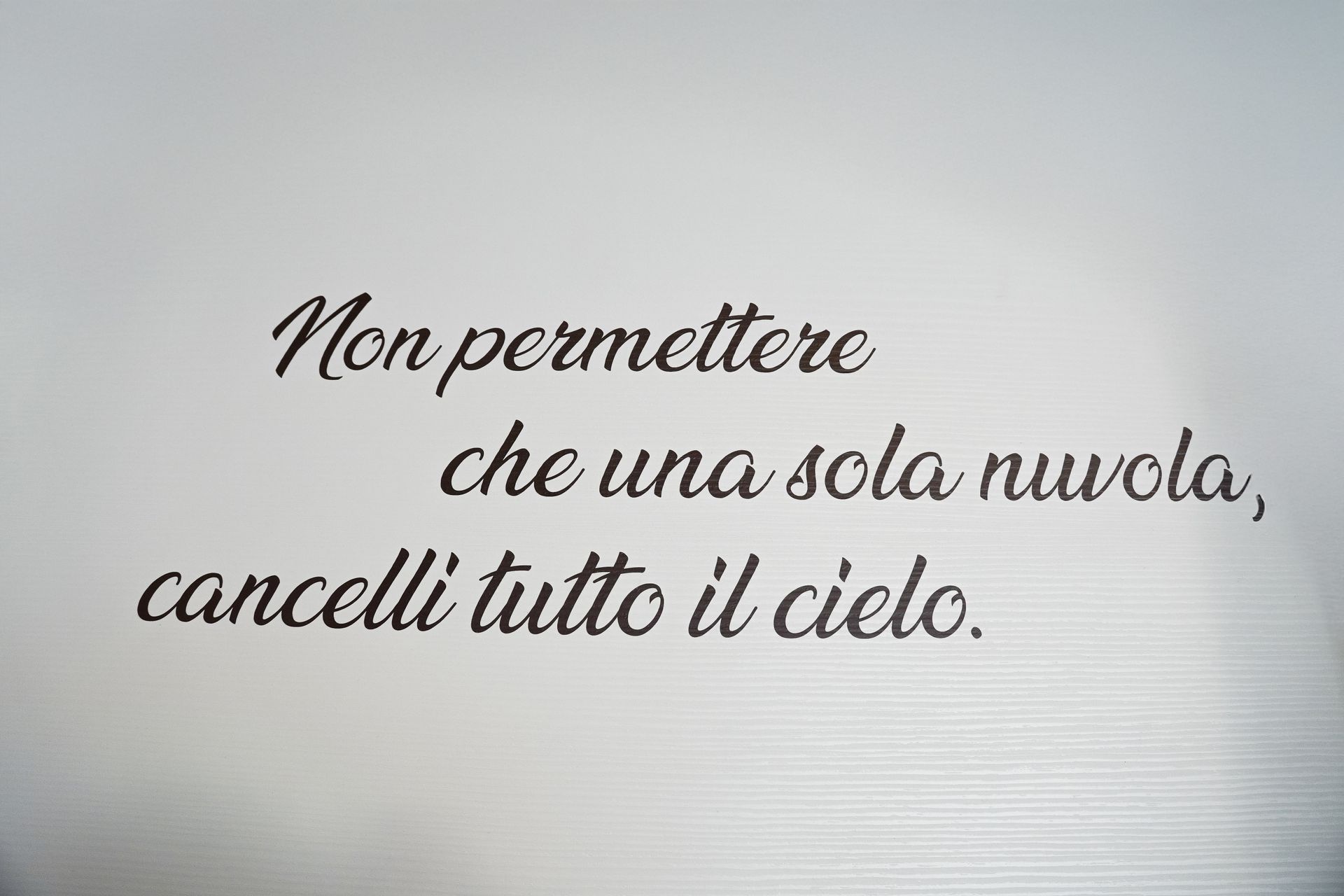 A quote in a foreign language that says 