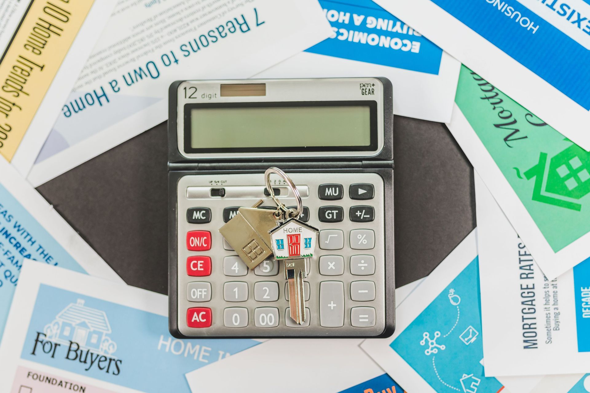 Calculator and house key representing California rent increase calculations