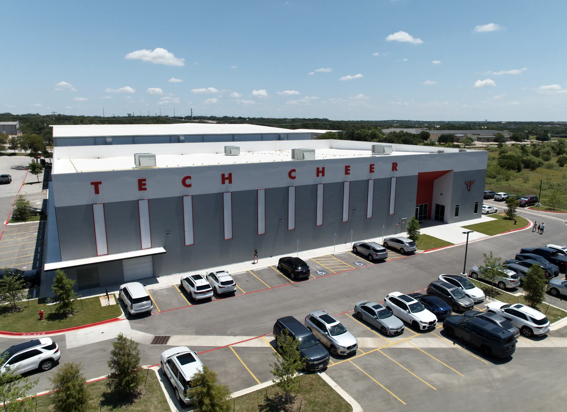 Exterior View of A Gray Building — Cedar Park, TX — Tech Cheer Exterior View of A Gray Building — Cedar Park, TX — Tech Cheer