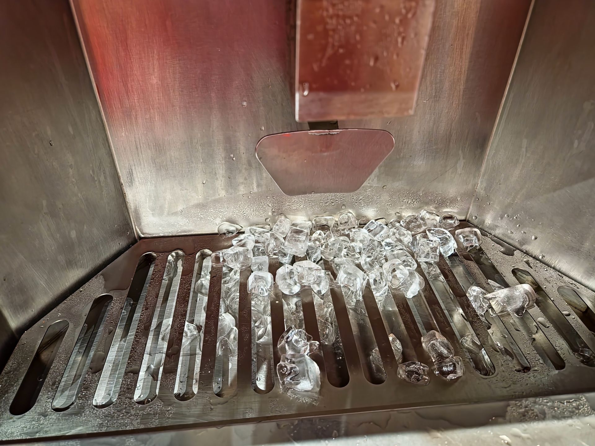 The interior of an ice maker machine. The interior of an ice maker machine.