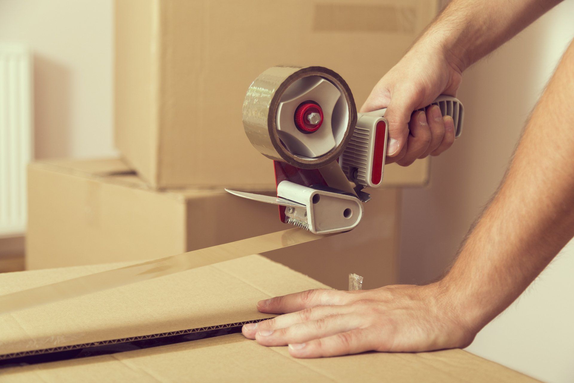 Movers Loading Cardboard Boxes — Corrimal, NSW — Pride Removals