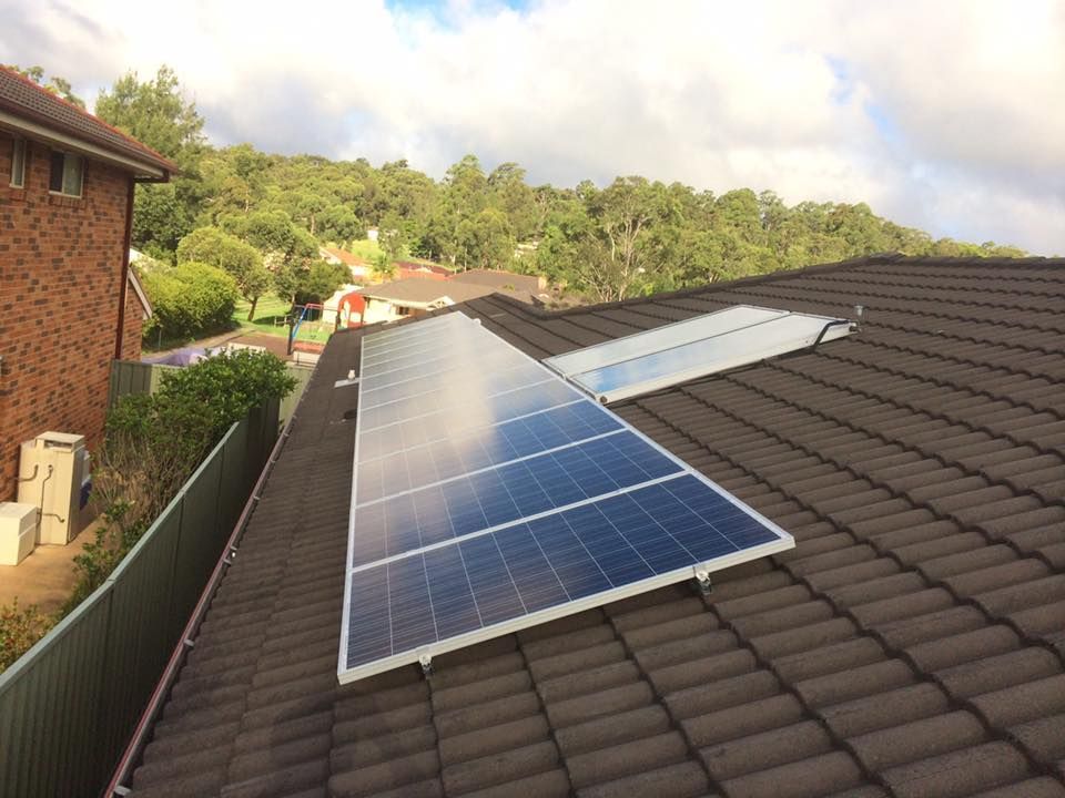 A Roof With A Lot Of Solar Panels On It — GJT Electrical In Warners Bay, NSW