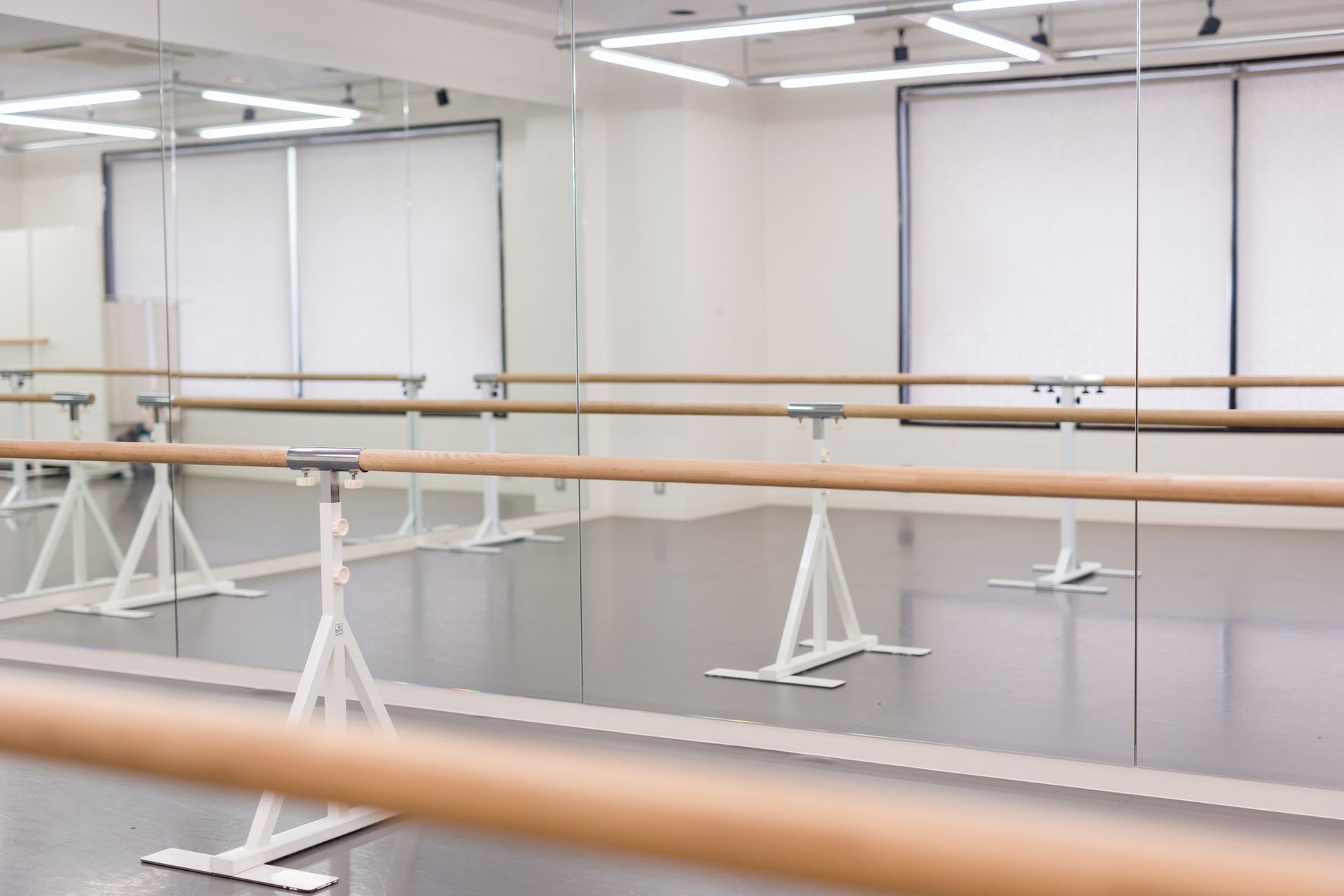 Unmanned ballet studio in the mirror with ballet lesson bar.