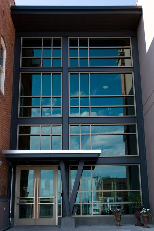 A building with a lot of windows and a door