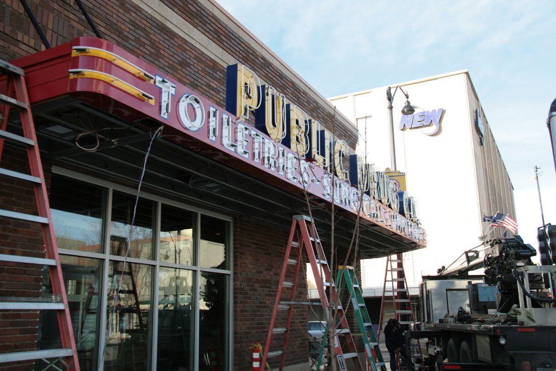 A building with a sign that says public library on it