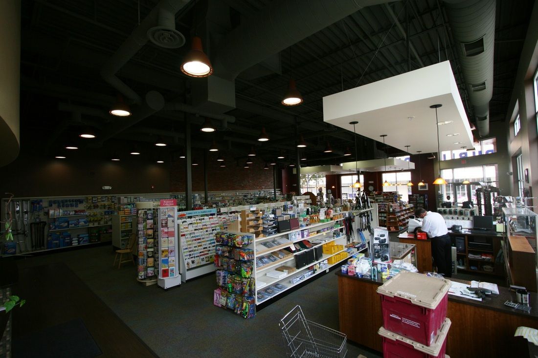 A store filled with lots of shelves and a counter.