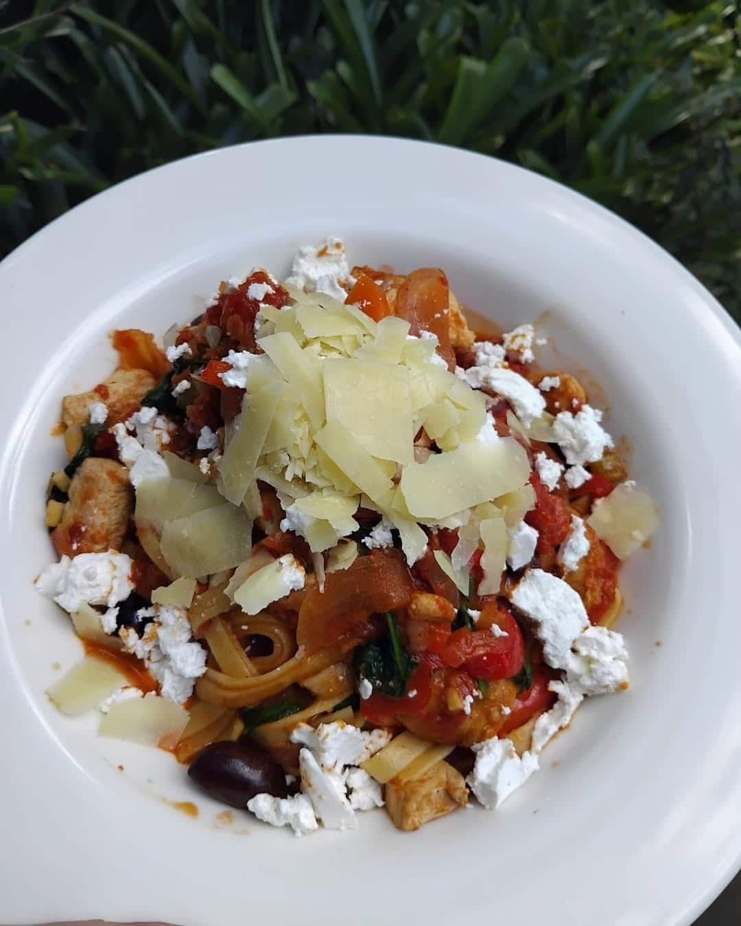 A Close Up Of A Plate Of Food With Cheese On Top — Vines at 139 in Grafton, NSW