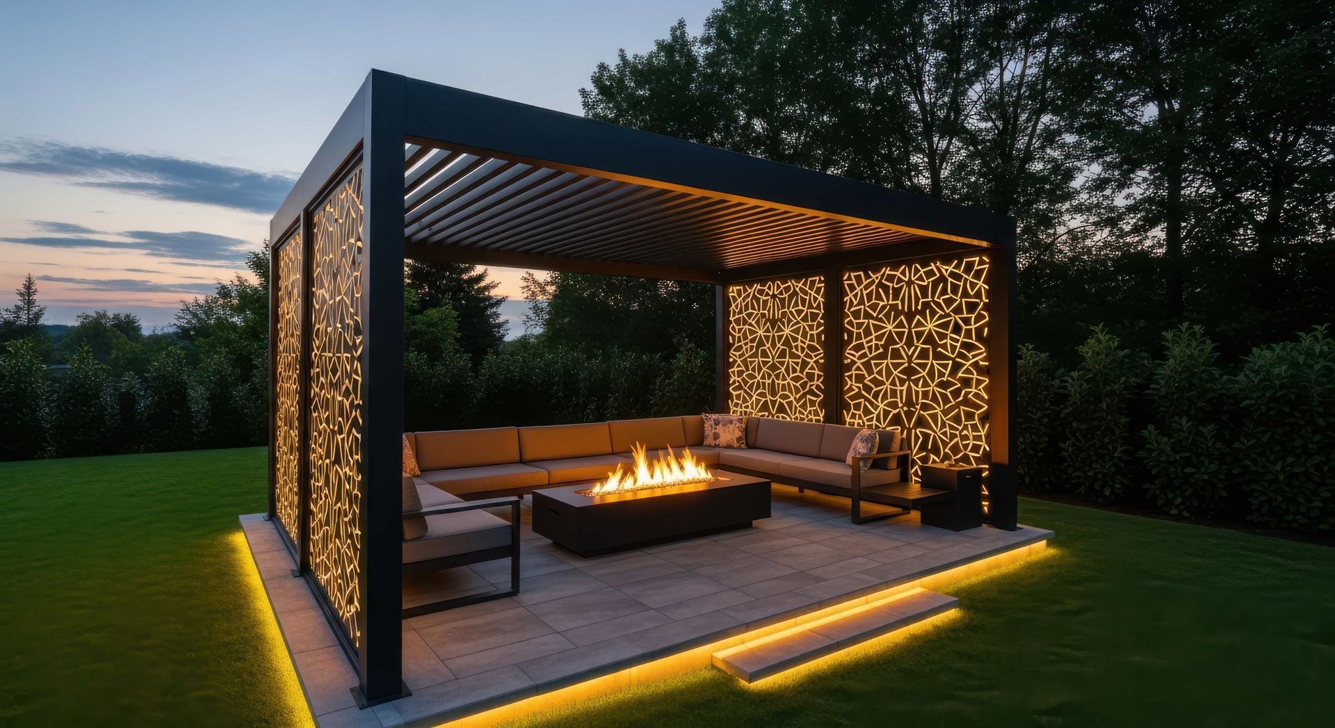 Modern outdoor patio with pergola, fire pit, built-in seating, and warm accent lighting at dusk