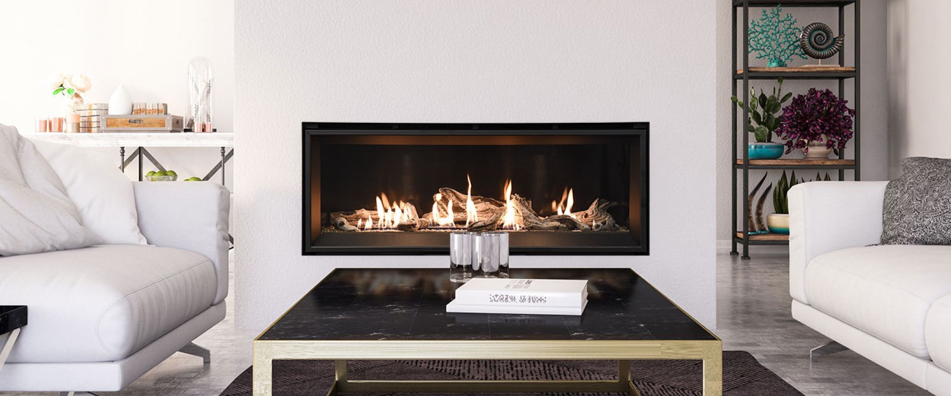 Modern living room with white sofas, a black fireplace, and a dark coffee table.