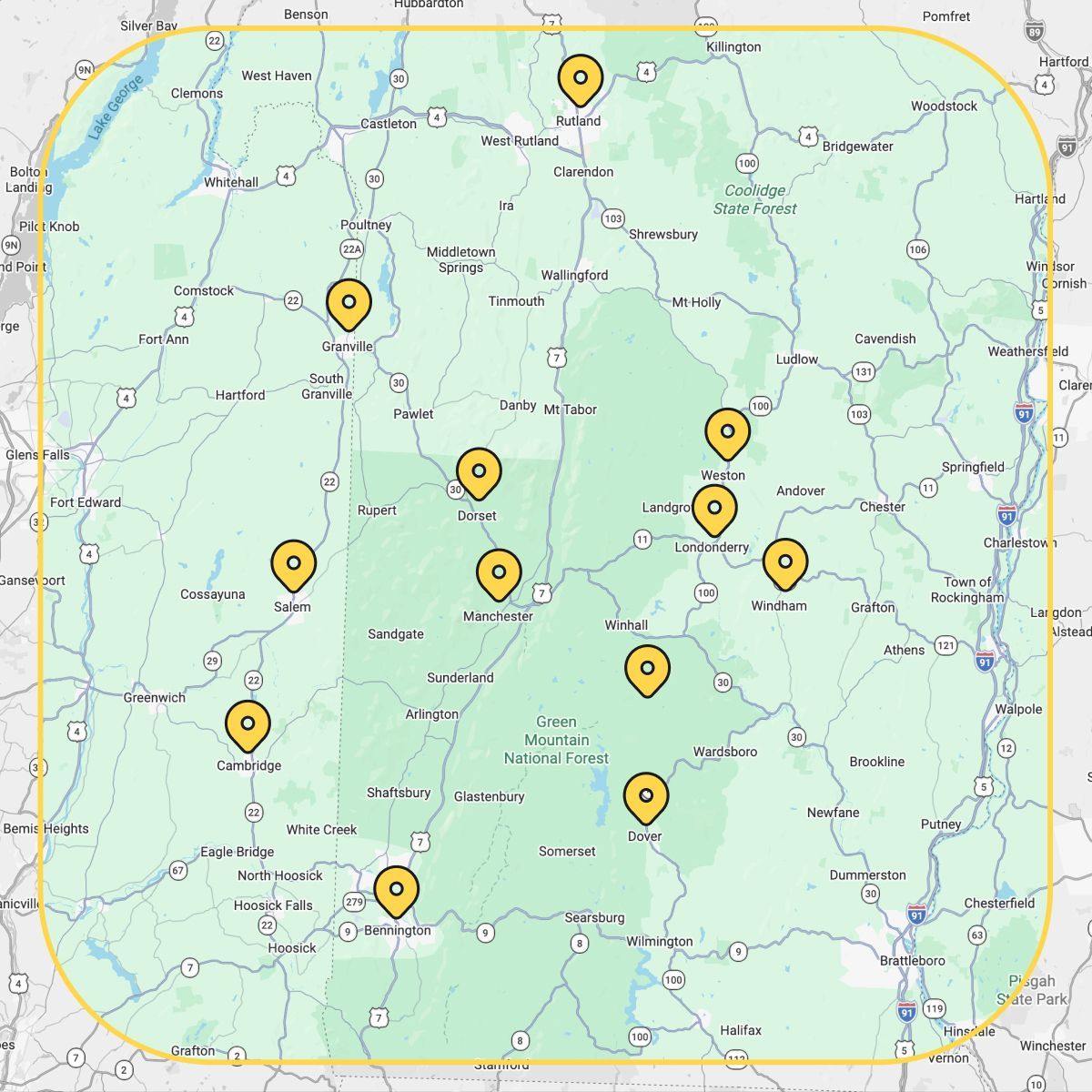 Map with multiple yellow location pins marking points across a green area.
