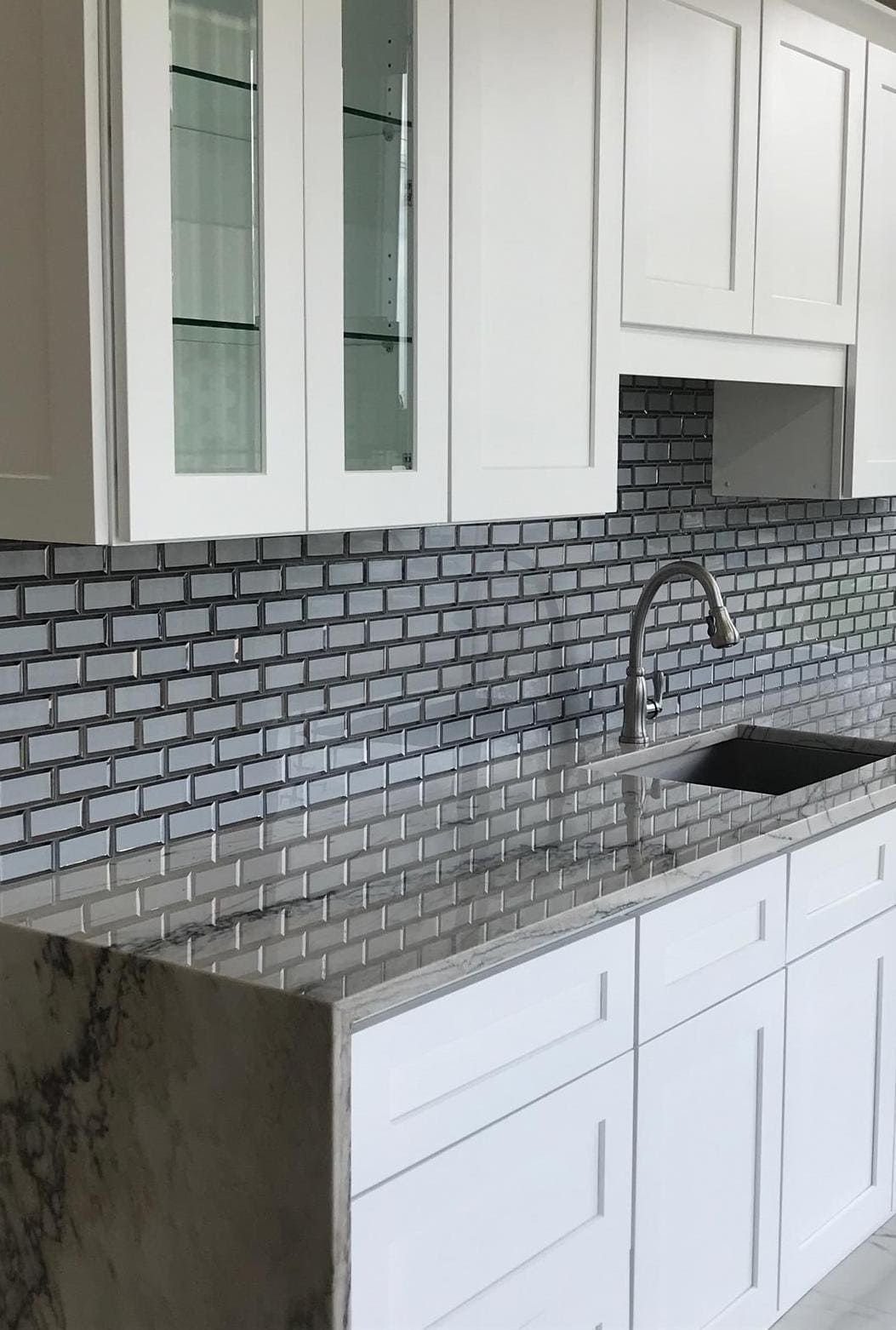 Rimini Brick mosaic on kitchen backsplash with textured pattern and earthy tones
