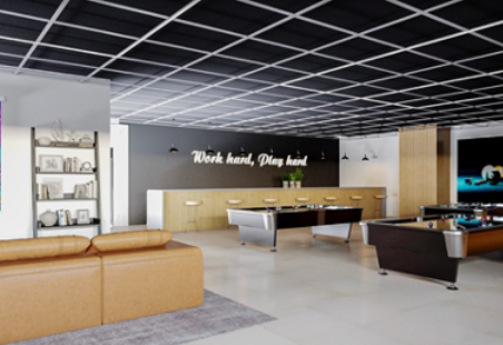 Recreation room with pool and foosball tables, tan couch, and 