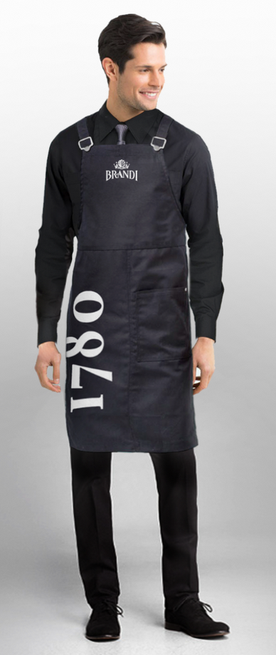 Man in black attire wearing a black apron with 