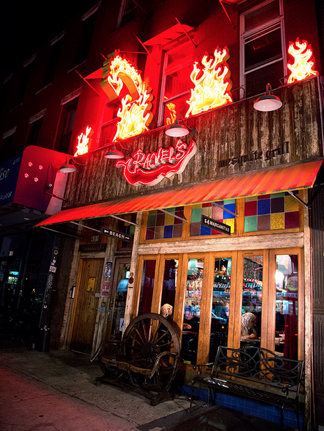 Night exterior of a bar called 