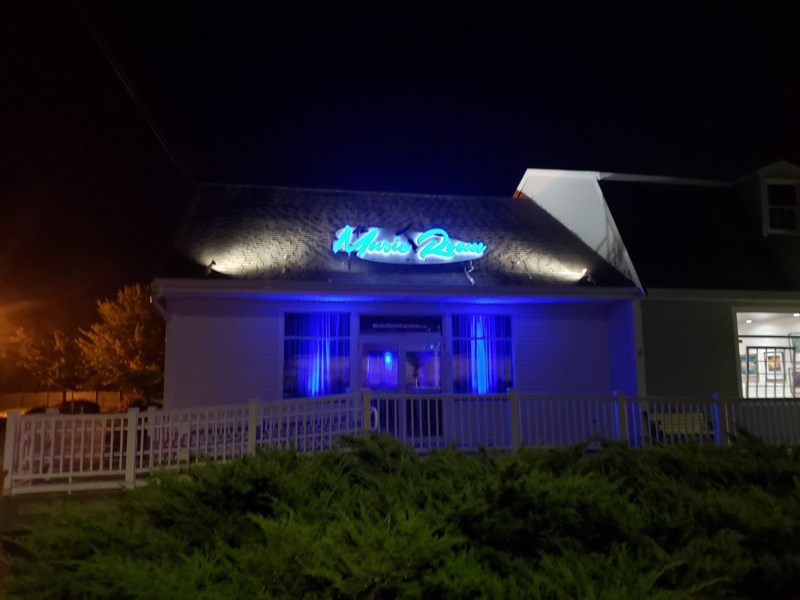 A blue neon sign reading 