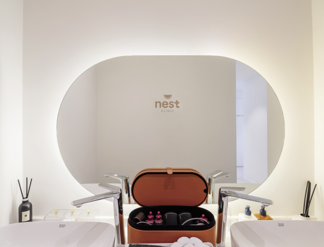 Treatment station with skincare products at Nest Clinic Gangnam