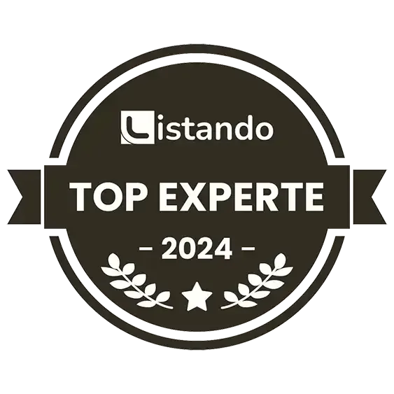 Es handelt sich um eine Plakette mit der Aufschrift „Top-Experte 2024“.