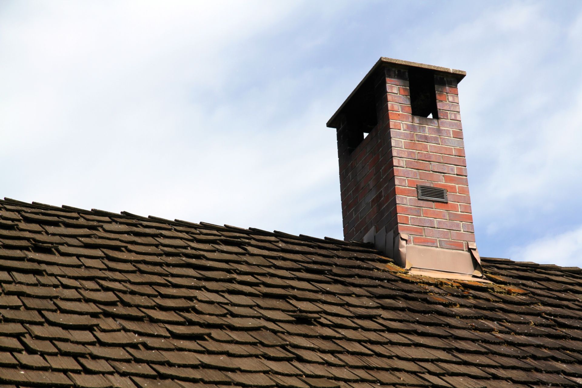 Man working on the top of the roof – Macungie, PA - Anytime Todd's Chimney Sweeping