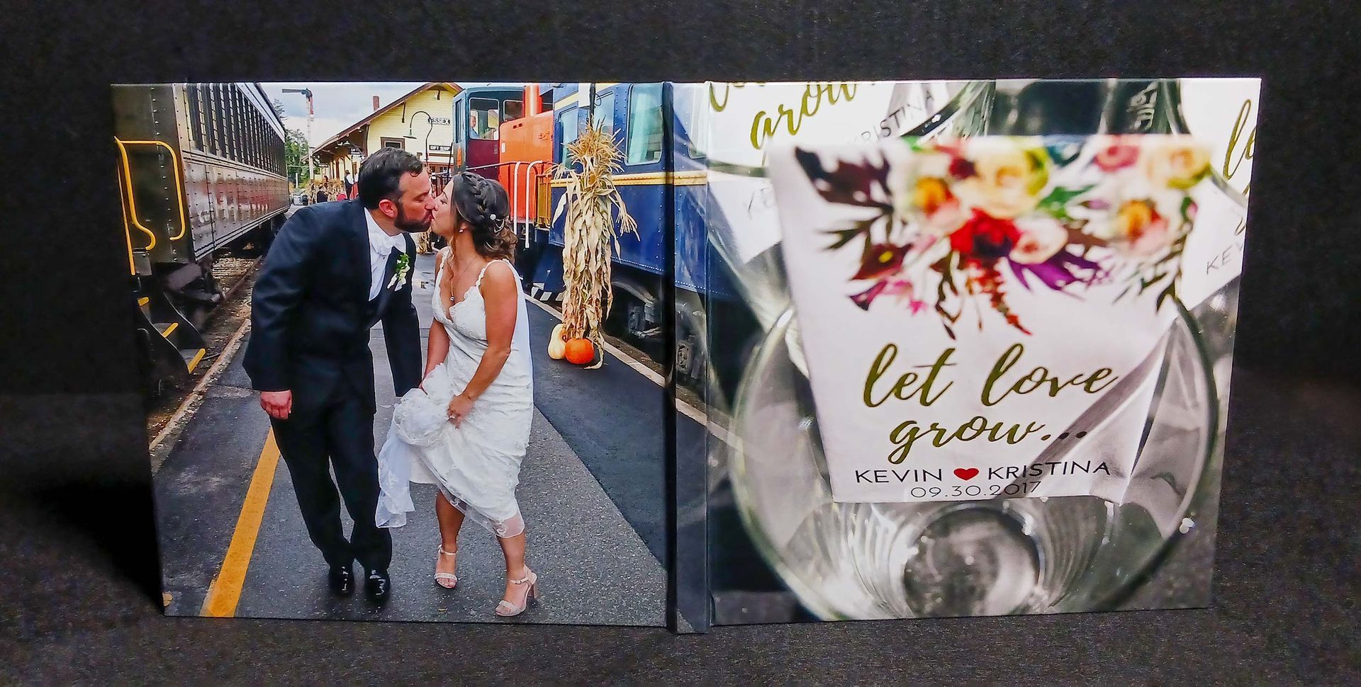 Coffee Table Wedding Album Cover with a Bride and groom walking in an urban alley beside a floral “let love” signboard