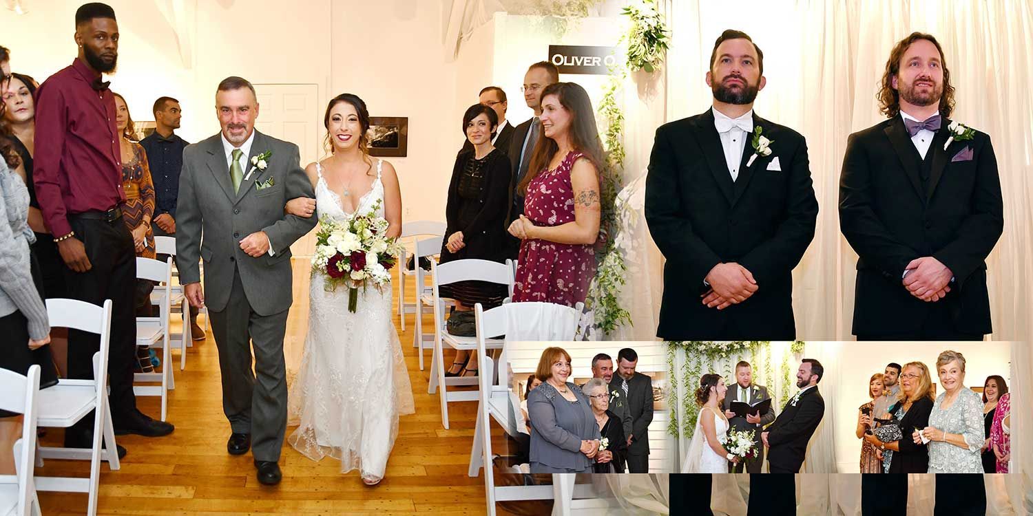 Bride and groom walk down the aisle at a wedding ceremony, with guests standing nearby.