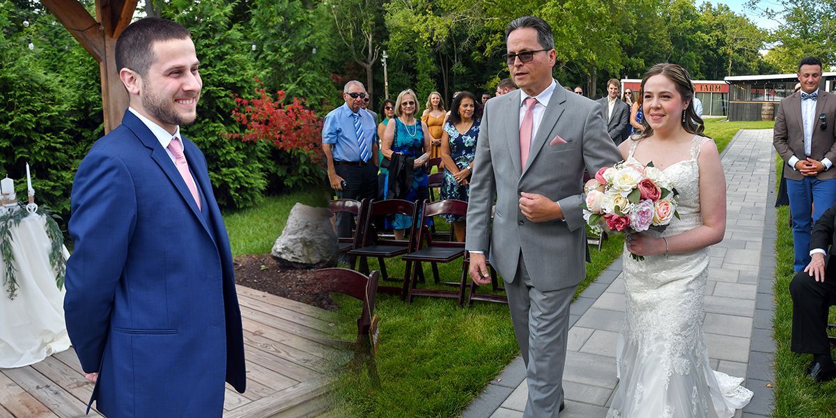 Bride and groom walking outdoors in wedding attire, holding a bouquet and arm in arm.