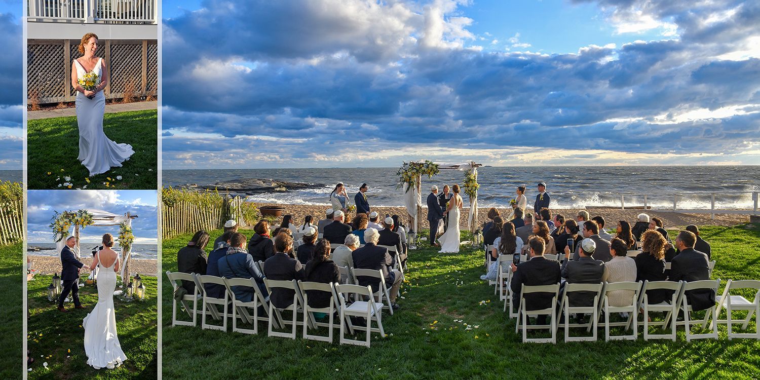 Outdoor wedding ceremony with bride in white dress and guests seated on a lawn under a cloudy sky.