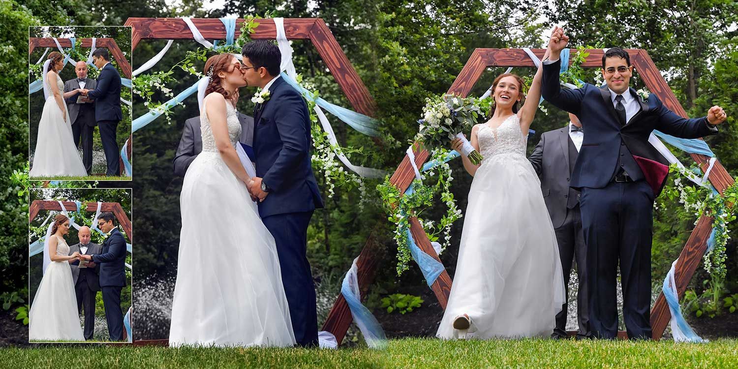 Bride and groom kiss in a garden wedding, surrounded by greenery and white drapery.